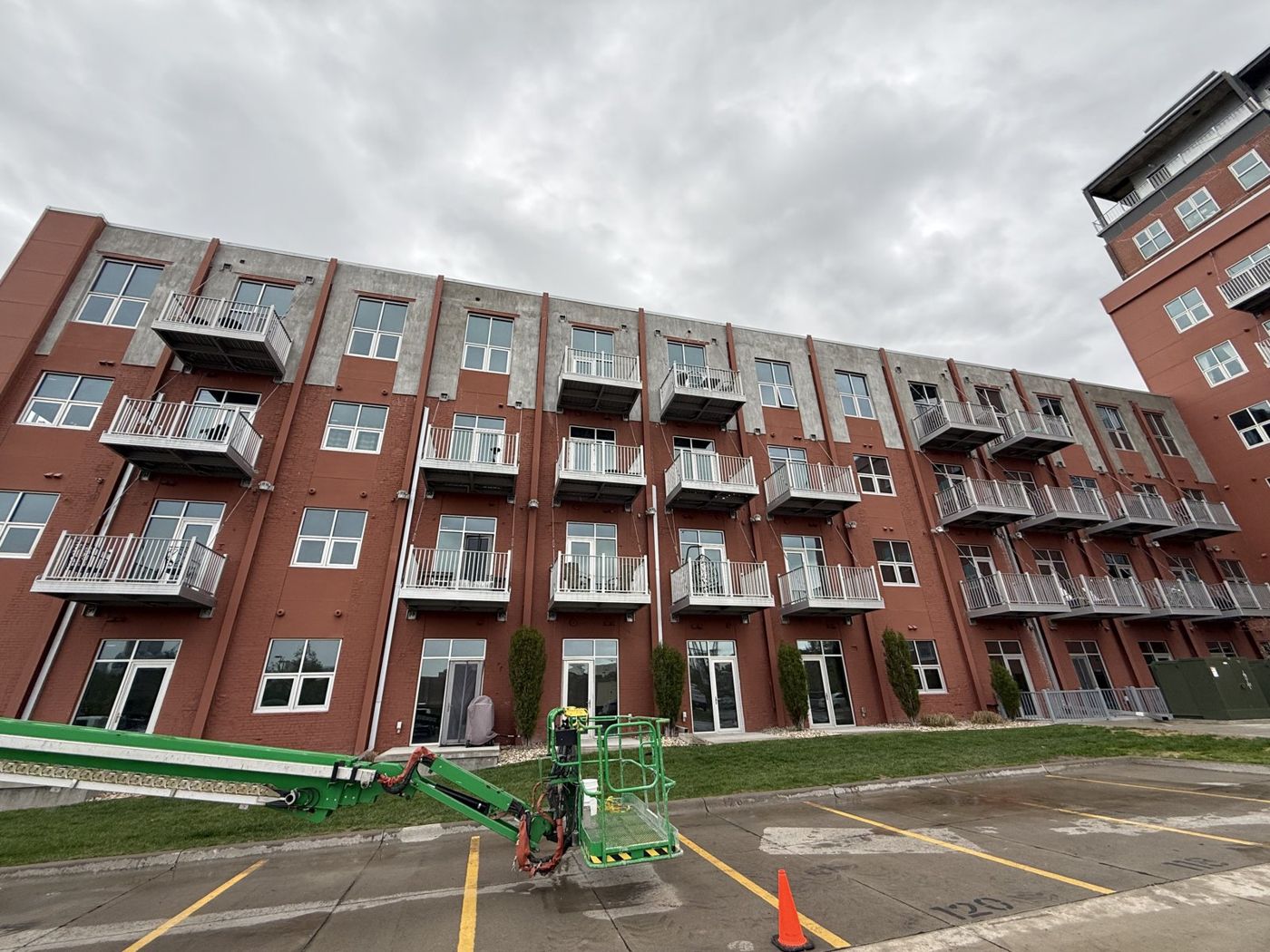 Brick facade restoration on a multi-story building near Omaha