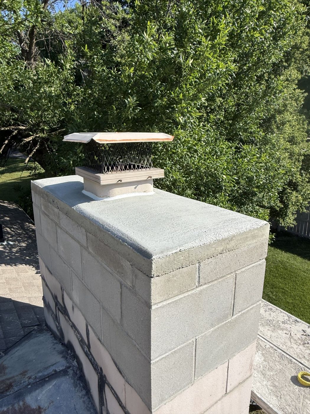 Rebuilt chimney masonry with new cap in the Omaha area