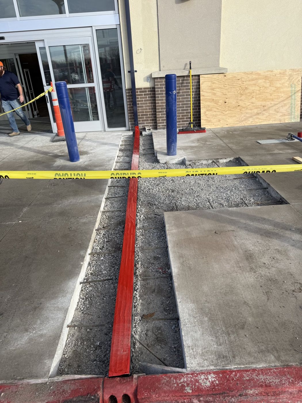 Concrete slab replacement at a commercial storefront entrance in the Omaha area