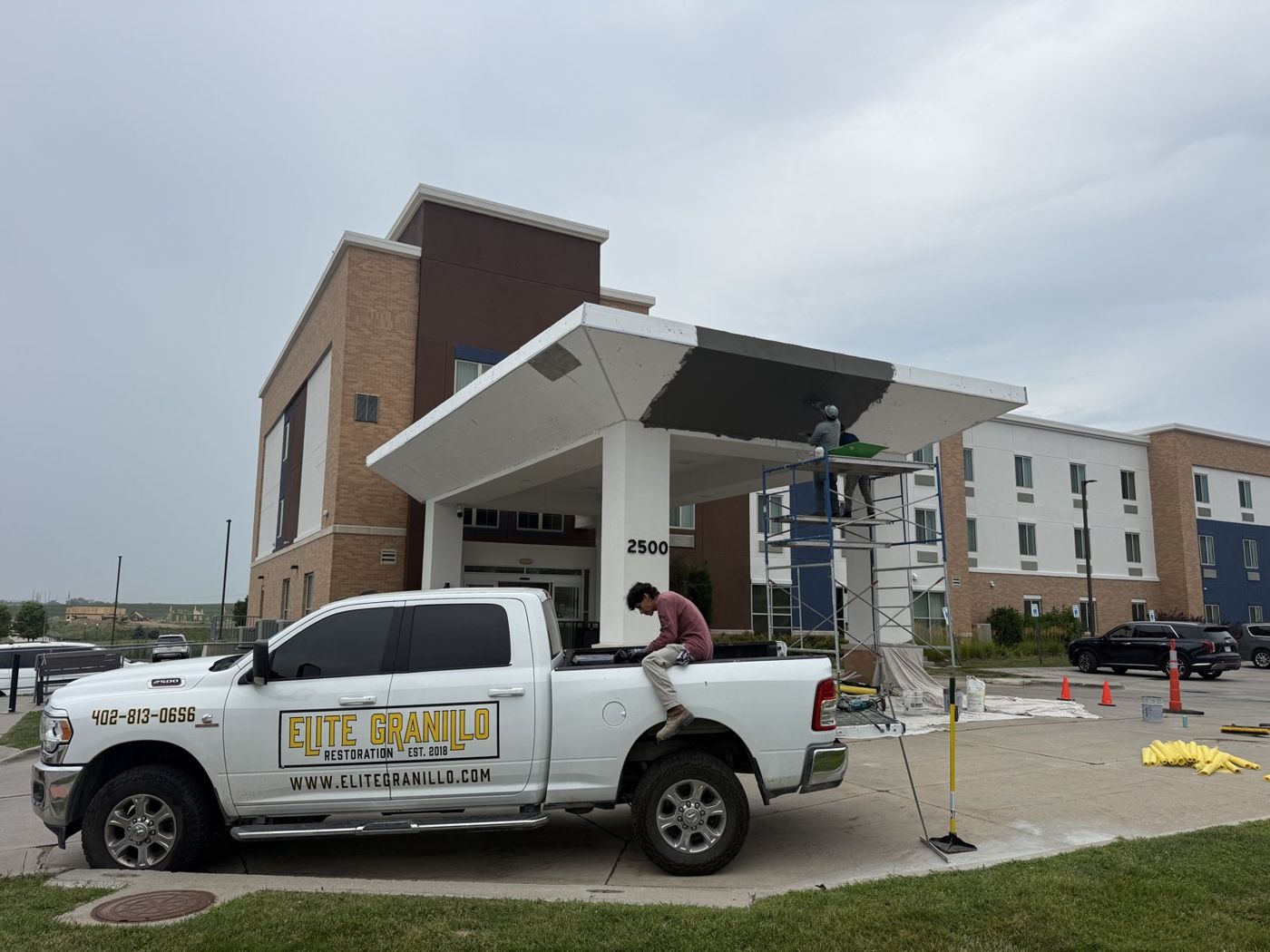 Elite Granillo Restoration work truck at a commercial project in the Omaha area