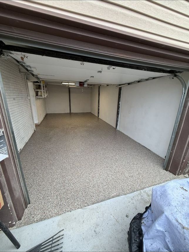 Finished flake garage floor coating at an Omaha-area home