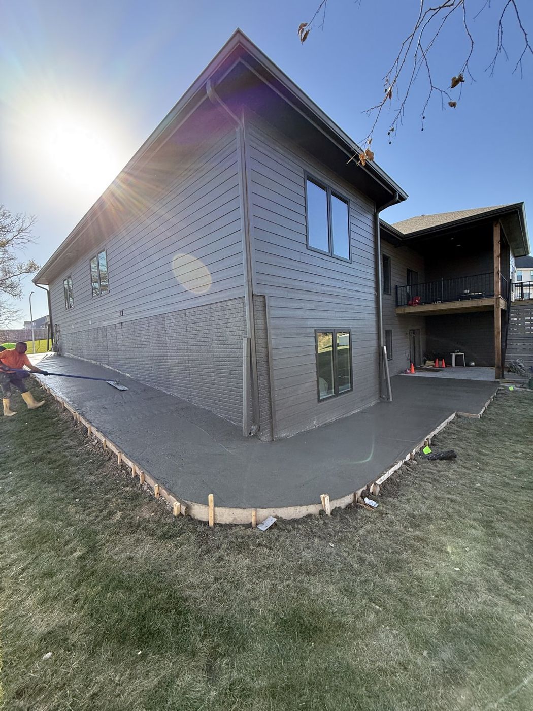 New concrete flatwork wrapping an apartment building in the Omaha area